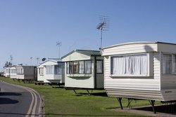 11995045-a-row-of-static-caravans-on-a-typical-british-summer-holiday-park.jpg