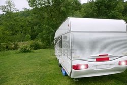 5897951-caravan-van-in-the-green-meadow-forest-camping.jpg